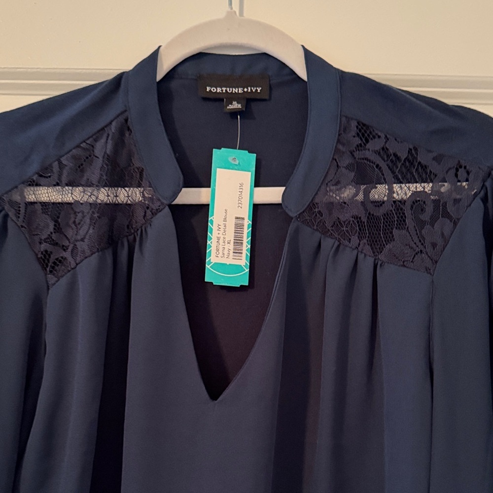 Elegant Navy Blouse with Lace Details